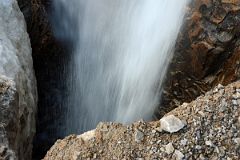 20 Carefully Looking Down At Waterfall From Angel Glacier From Top Of Climbing Scree Slope On Mount Edith Cavell.jpg